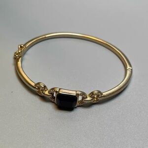 Elegant Gold and Black Bracelet